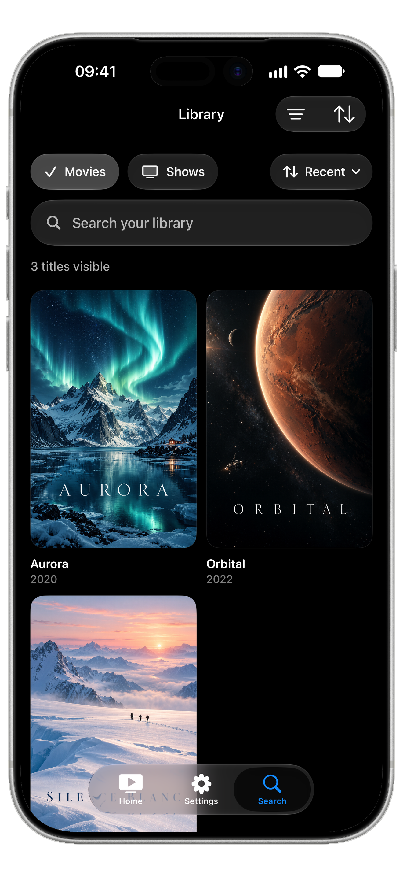 ReelFin iPhone library screen with search and movie collections.
